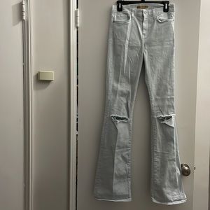 Rebecca Minkoff sunset flare midrise Jean in baby blue with distressed knee